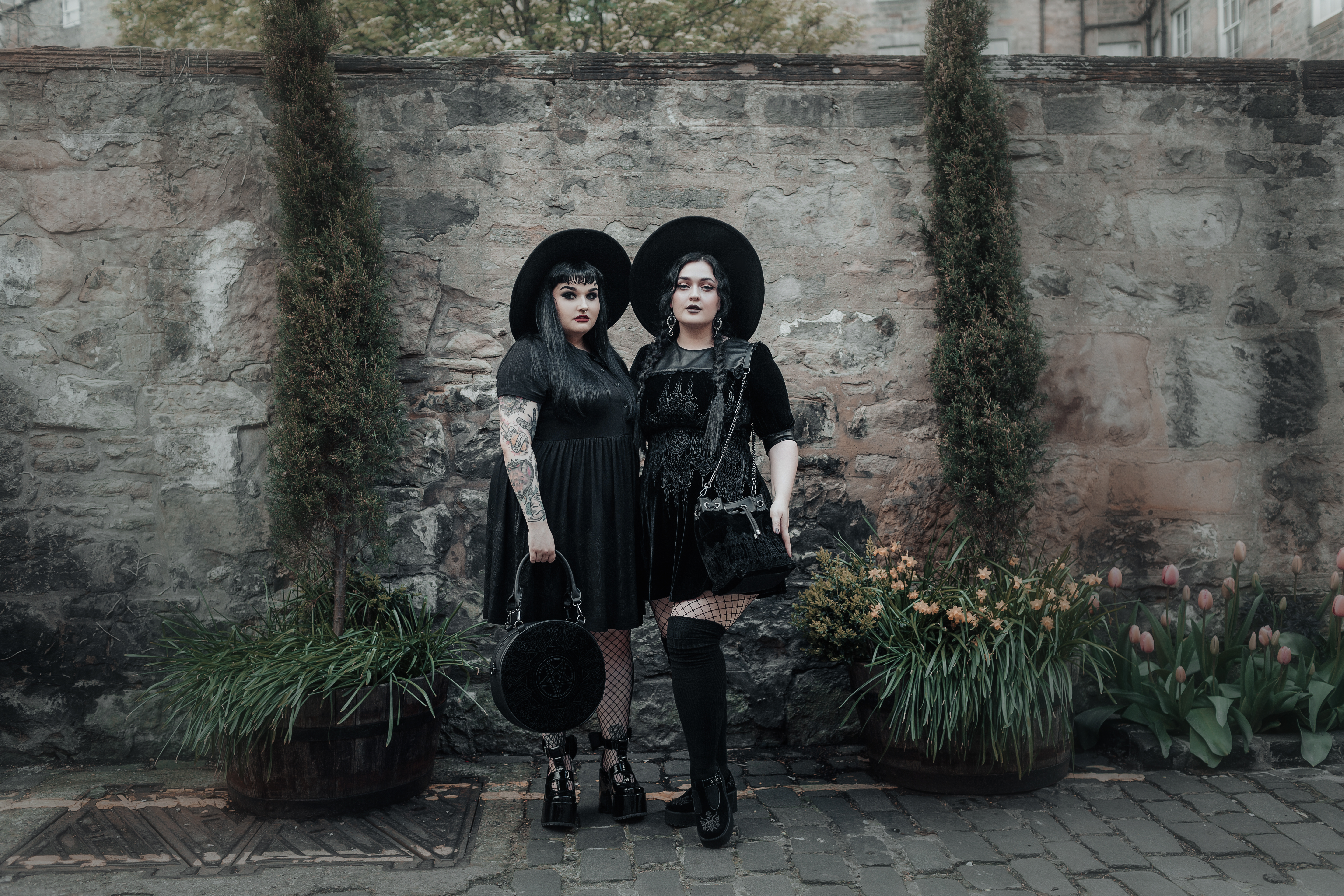 beautiful plus size models wearing gothic attire pentagram bag